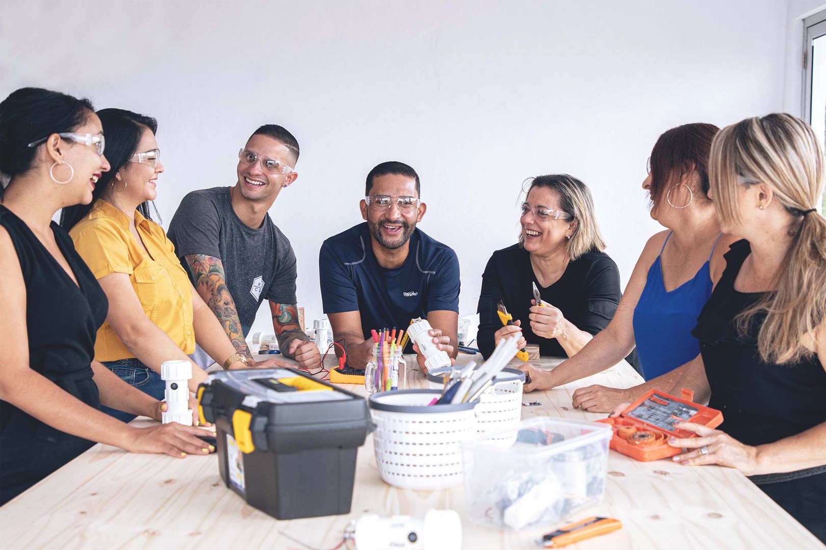 a diverse team bonds with one another during a smith assembly workshop