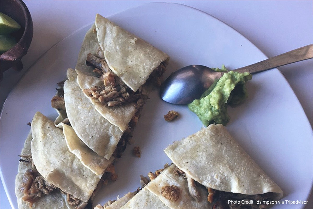 a plate of tacos with a dollop of guacamole from la popular, a restaurant in oaxaca mexico (photo credit: ldsimpson via tripadvisor)